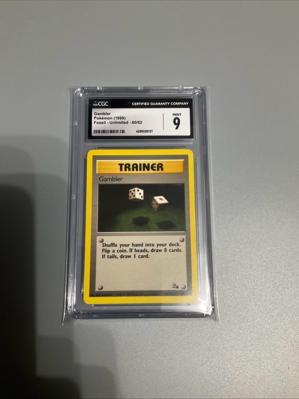 Gambler Trainer Pokémon Card - Yellow Border (CGC Mint 9)